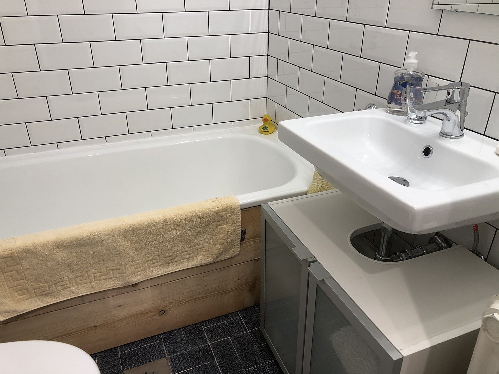 Bathroom with bath & shower